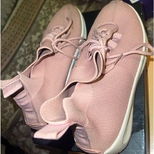 Pink sneakers.